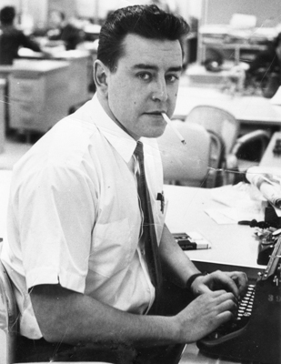 Reguly smokes at his desk Toronto Star